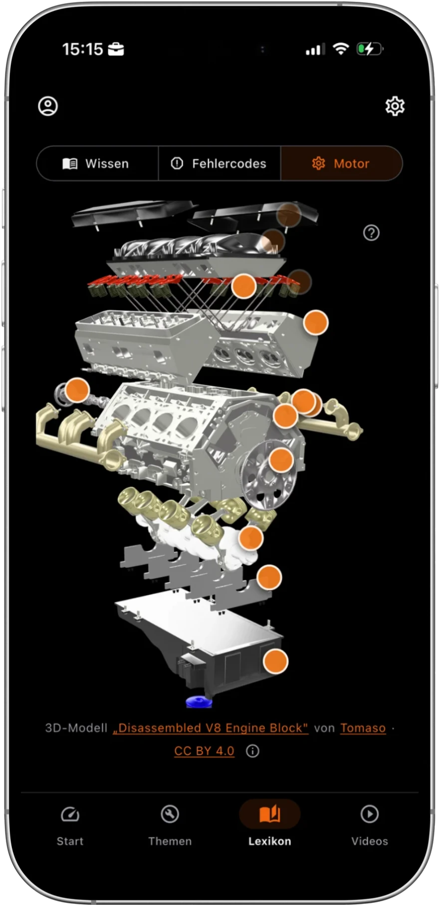 Der V8-Motor im Lexikon von Myster, in seine Bauteile auseinandergezogen; jedes Teil trägt einen antippbaren Punkt.